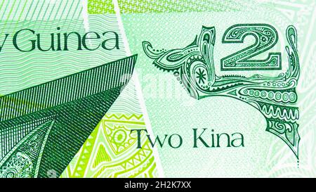 2 Kina polymer banknote, Bank of Papua New Guinea, closeup bill fragment shows Face value and National arts, issued 2014 Stock Photo