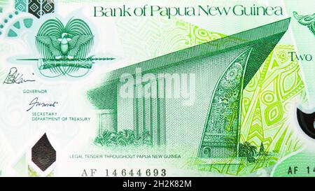 2 Kina polymer banknote, Bank of Papua New Guinea, closeup bill fragment shows a fragment of the Parliament building in Port Moresby, issued 2014 Stock Photo