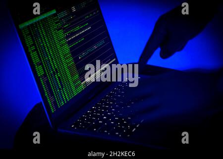 Symbolic image cyber attack, computer crime, cybercrime, computer hackers attack a network, computer, IT infrastructure Stock Photo