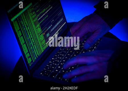 Symbolic image cyber attack, computer crime, cybercrime, computer hackers attack a network, computer, IT infrastructure Stock Photo