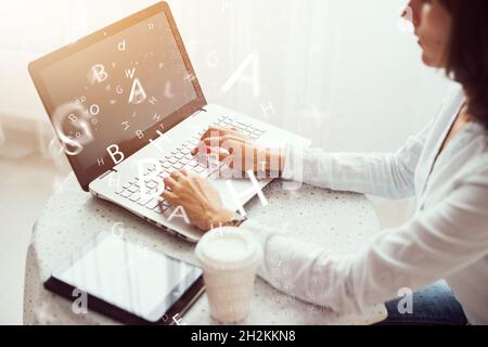 Woman working in home office hand on keyboard close up Stock Photo