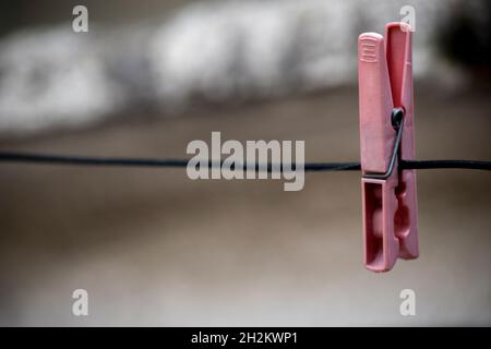 plastic clips to hang freshly washed clothes Stock Photo