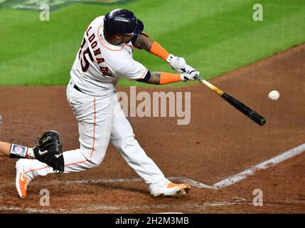 Martin Maldonado of the Houston Astros hits an RBI single in the second  inning of Game 2 of the World Series against the Atlanta Braves on Oct. 27,  2021, at Minute Maid