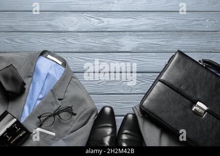 Set of stylish male accessories on dark wooden background Stock Photo