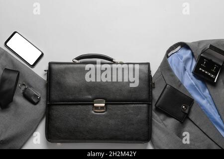 Set of stylish male accessories and clothes on grey background Stock Photo