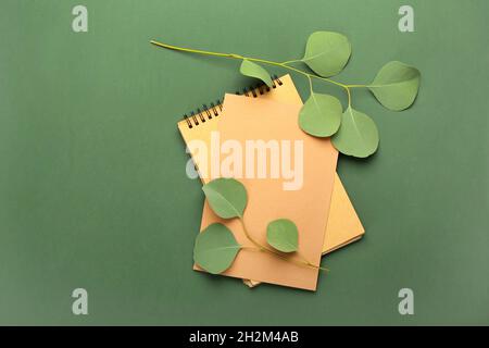 Blank paper sheet, notebook and on color background Stock Photo