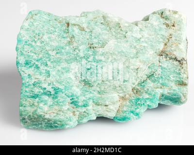 Amazonite on a white background. Exotic ornamental stone. Stock Photo