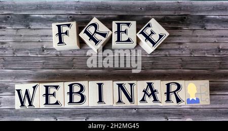 free webinar - internet communication concept - collage of separate blocks on wooden table Stock Photo