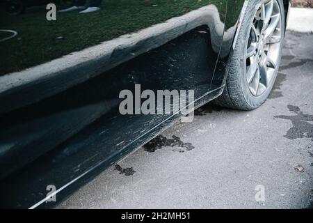 close-up mud splashes on black car in natural lighting Stock Photo
