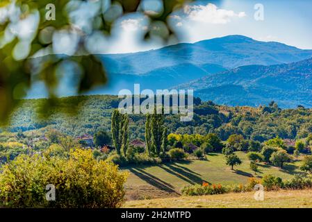Colorful autumn mountain scenery with long afternoon shadows Stock Photo