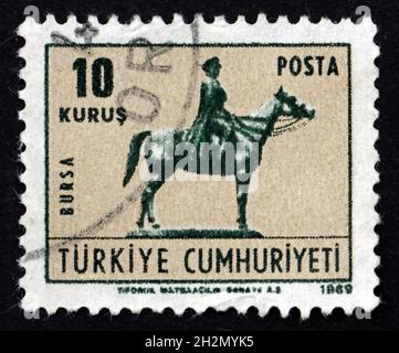 TURKEY - CIRCA 1969: a stamp printed in Turkey shows Equestrian Statue of Ataturk in Bursa, circa 1969 Stock Photo