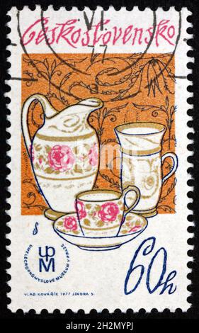 CZECHOSLOVAKIA - CIRCA 1977: a stamp printed in Czechoslovakia shows Cup and Saucer, Czechoslovak Porcelain and Porcelain Mark, circa 1977 Stock Photo