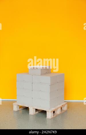 Stack of boxes on pallet in industry Stock Photo
