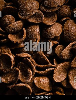 Pattern of crackers flat laid against pink polka dot background Stock Photo