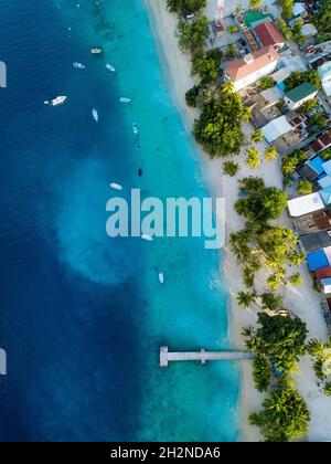 Maldives, Meemu Atoll, Mulah, Aerial view of coastline of inhabited island in Indian Ocean Stock Photo