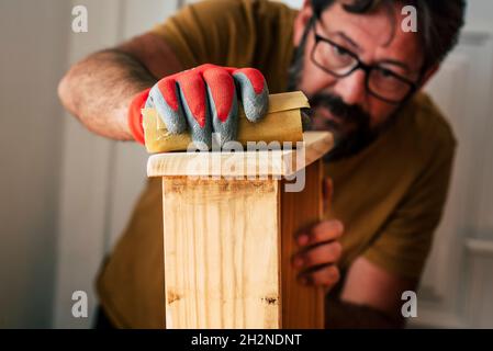 Male carpenter working at home Stock Photo