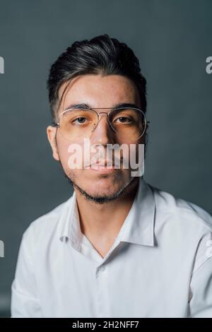 Confident young man in eyeglasses Stock Photo