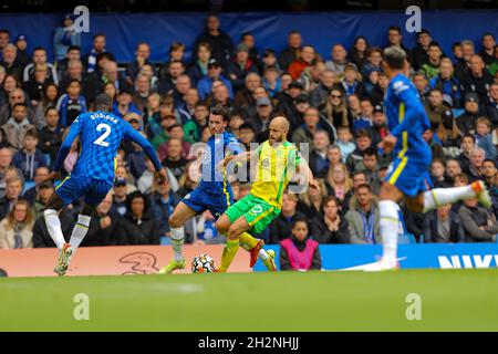 Stamford Bridge, Chelsea, London, UK. 23rd Oct, 2021. Premier League football Chelsea FC versus Norwich City: Ben Chilwell (21) of Chelsea and Teemu Pukki (22) of Norwich City Credit: Action Plus Sports/Alamy Live News Stock Photo