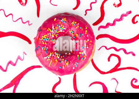 Creative sweet food. Glazed colorful donut on a bright watercolor painted background. Stock Photo
