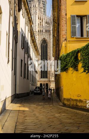 Milan, Italy - June 13, 2017: View of Milan Duomo between Traditional Old Buildings Stock Photo