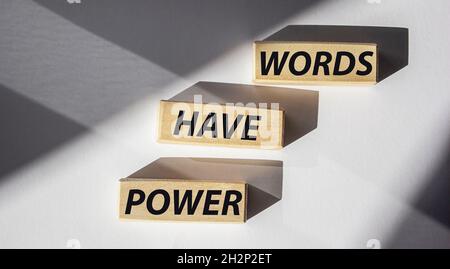 Words have power written on wooden cubes and white background Stock Photo