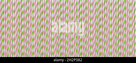 Vertical disposable pink green drinking straws macro as texture. Wide banner background of striped cocktail paper tubes. Stock Photo