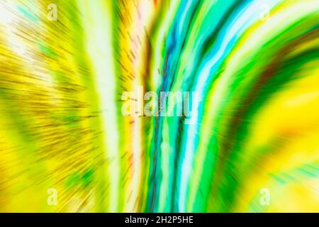 Blurred multicolored colorful background with flying stripes. Bright abstraction. Stock Photo