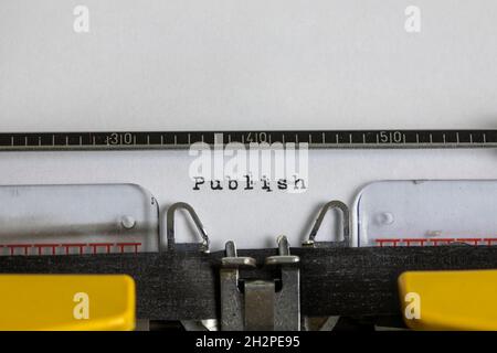 Publish written on an old typewriter Stock Photo