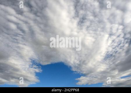 Cirrocumulus and altocumulus clouds Stock Photo