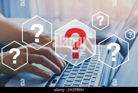 Quiestions online, interrogation marks what where when how and why, FAQ, search answer information on internet Stock Photo