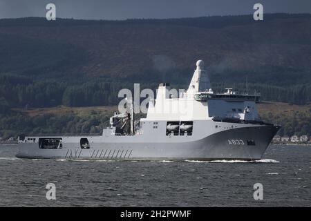 HNLMS Karel Doorman (A833), a Karel Doorman-class Joint Support Ship owned by the Royal Netherlands Navy, and operated jointly with the German Navy, passing Gourock on the Firth of Clyde. The vessel was on the Clyde as she paid a quick visit after participating in the military exercise Dynamic Mariner 2021 and Joint Warrior 21-2. Stock Photo