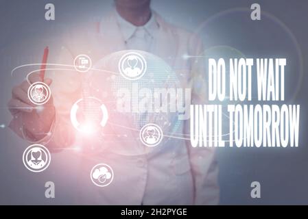 Text showing inspiration Do Not Wait Until Tomorrow. Business showcase needed to do it right away Urgent Better do now Lady In Uniform Holding Tablet Stock Photo