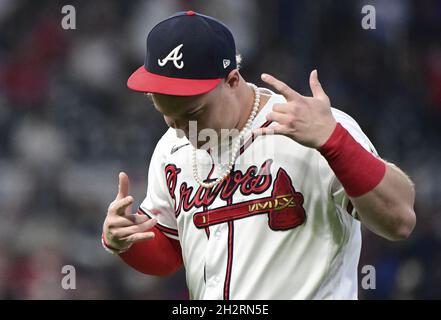 Atlanta, United States. 23rd Oct, 2021. Atlanta Braves Joc Pederson, a former Los Angeles Dodgers, wears the pearl necklace he ordered as a fashion statement and debut on September 29th gestures during warmups before the Braves host the Dodgers in game six of the MLB NLCS at Truist Park on Saturday, October 23, 2021 in Atlanta, Georgia. The Dodgers face an elimination game trailing the Braves 3-2 in the championship series. Photo by David Tulis/UPI Credit: UPI/Alamy Live News Stock Photo