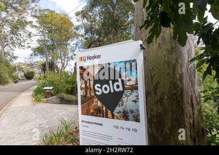 Clareville in Sydney,LJ Hooker real estate agent has sold a waterfront property in a heated Sydney property market,NSW,Australia Stock Photo