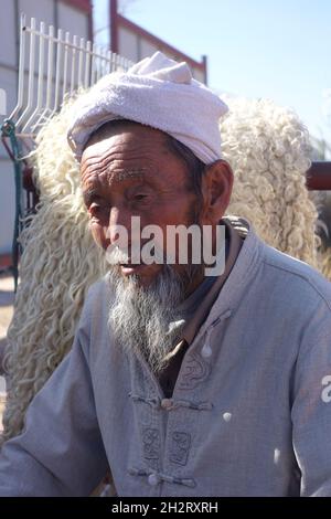 Elder Chinese man with turban at Jingbian, China Stock Photo - Alamy