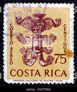 COSTA RICA - CIRCA 1963: a stamp printed in Costa Rica shows Six-limbed figure, ancestral figure, circa 1963 Stock Photo