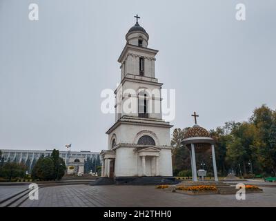 The bell tower near the Metropolitan Cathedral Nativity of the Lord with the view to the Triumphal Arch in Chisinau, Moldova. Historical and architect Stock Photo