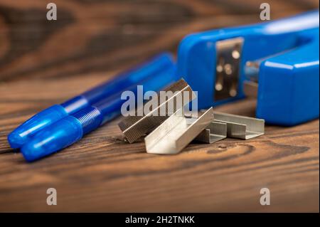 Stationery stapler, stapler staples, close-up selective focus Stock Photo