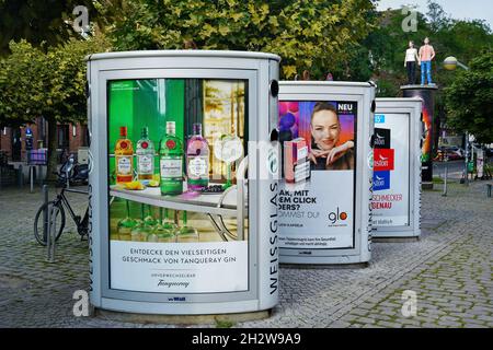 Modern and colourful waste glass/bottle containers in the Old Town of Düsseldorf/Germany. Stock Photo