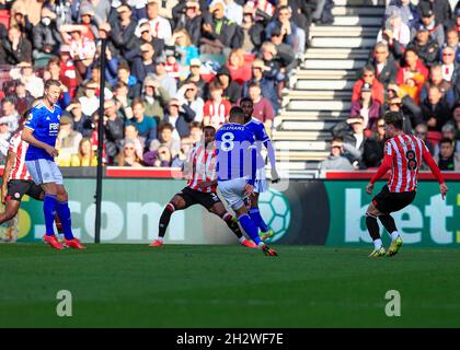 Brentford Community Stadium, London, UK. 24th Oct, 2021. Premier League Football Brentford versus Leicester; Youri Tielemans of Leicester City shoots to score his sides 1st goal in the 14th minute to make it 0-1 Credit: Action Plus Sports/Alamy Live News Stock Photo