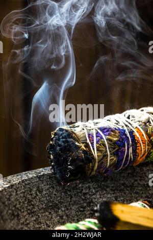 Smudge Ritual Burning Sage Stick. Spiritual Meditation and Yoga Ritual  Stock Photo