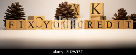 The word fix you credit was created from wooden cubes. Stock Photo