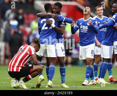 London, UK. 24th Oct, 2021. Ivan Toney of Brentford looks dejected as Kiernan Dewsbury-Hall and Kelechi Iheanacho of Leicester City celebrate after the Premier League match at Brentford Community Stadium, London. Picture credit should read: Paul Terry/Sportimage Credit: Sportimage/Alamy Live News Stock Photo