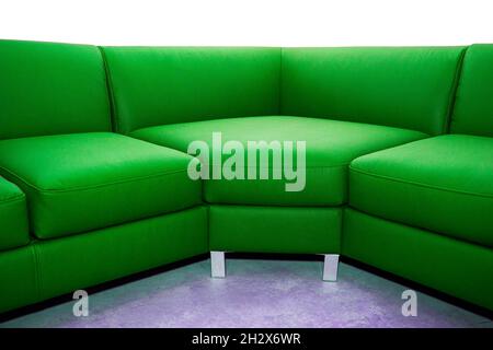 Corner folding sofa upholstered in leatherette, insulated on a white background Stock Photo