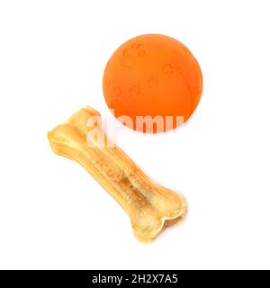 Ball and chewing bone - dog toys isolated on white background. Stock Photo