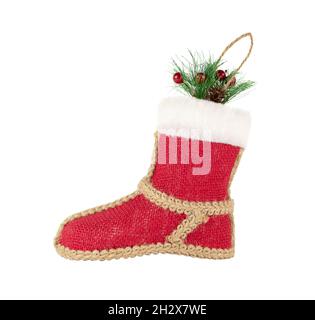Christmas decoration, red boot in rustic style isolated on a white background. Stock Photo