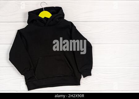 Black sweatshirt with a hood mockup template. Stock Photo