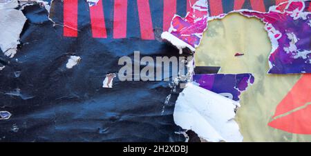 Old grunge ripped torn collage posters creased crumpled paper placard texture background Stock Photo