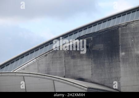 Damage to exterior of Crossness sewage treatment works sludge incinerator. Stock Photo