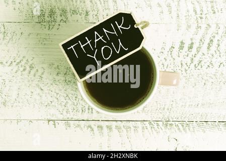 Sign displaying Thank You. Word for a polite expression used when acknowledging a gift or service New Coffee Shop Ideas Writing Important Notes Warm Stock Photo